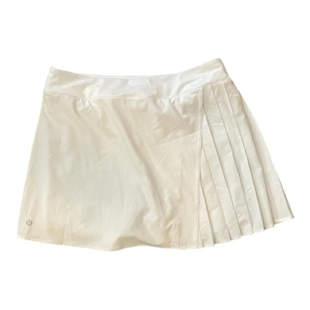 #087, Lululemon Asymmetrical pleated tennis skirt, NWOT, size 8